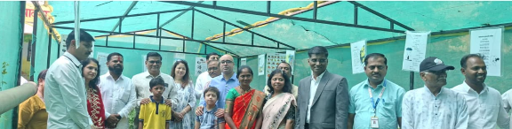 Gathering inside the Akshar Sheti structure